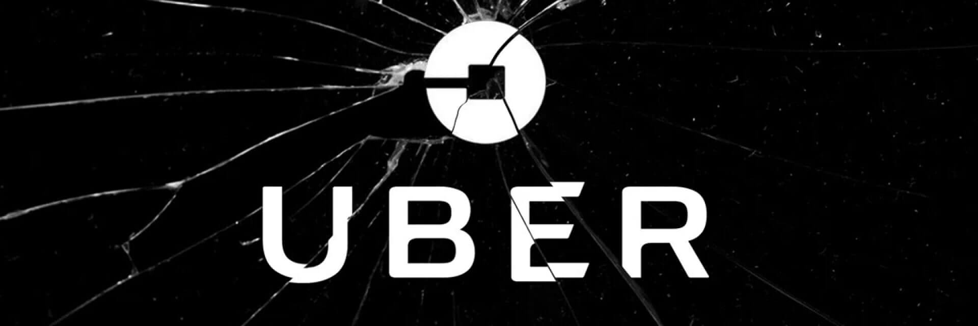 ein zerbrochener Bildschirm mit dem Uber-Logo darauf