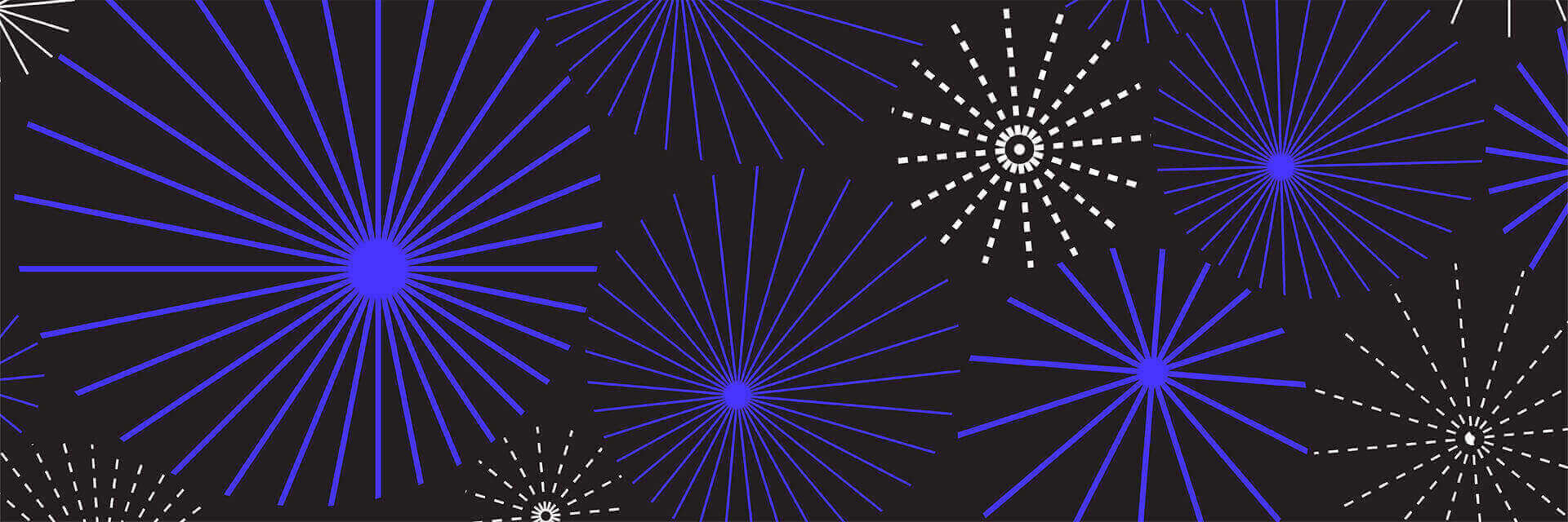 blue and white fireworks on a black background