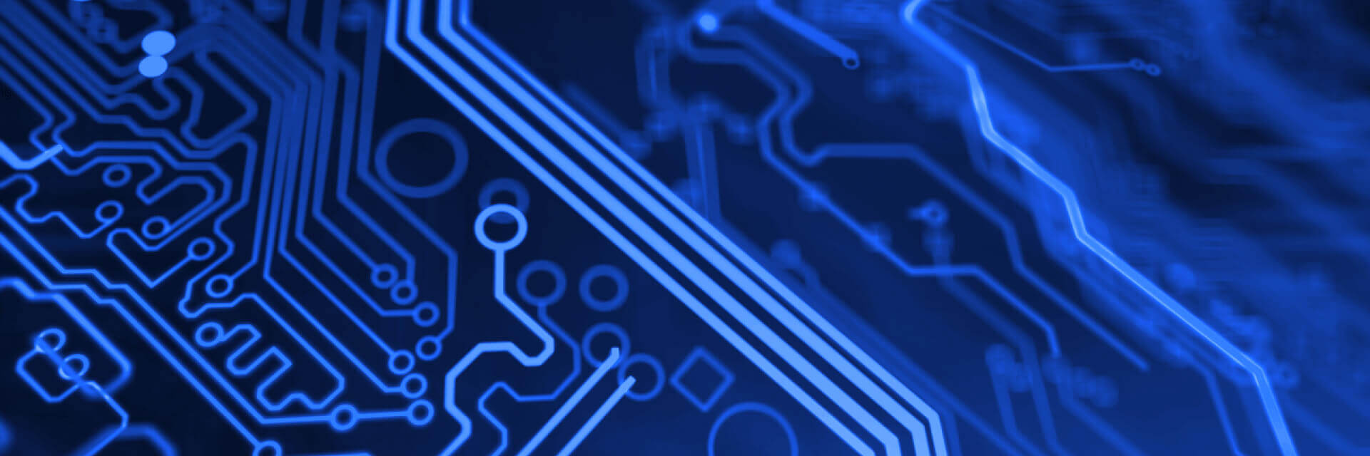 a close up of a circuit board with a blue background