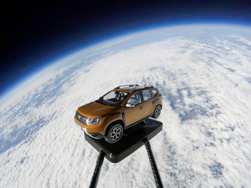 <h3 class='heading-large'>Seriously New Heights</h3><p>We launched a car to space! Not a real one, but it still made it.</p>