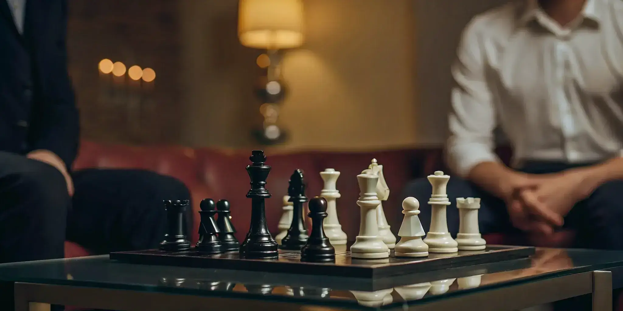 A chess game between two people representing competitive strategies in marketing.